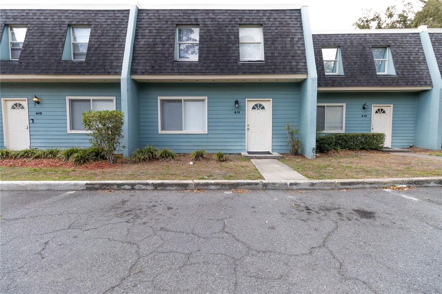 Forget the "fixer-upper" stress—this 4-bedroom, 2.5-bathroom gem in the Cricket Club Community is ready for its main character moment! ?? Perfectly perched near UF, Santa Fe, Shands, and I-75, you’re right in the heart of the action while enjoying a totally carpet-free, low-maintenance lifestyle.

The Grand Tour:
Walk in and breathe easy—there’s no carpet to worry about here! To your left, you’ll find a handy coat closet and a versatile first bedroom (hello, dream home office or guest suite!). To your right, there's a quick-stop half-bath and the staircase. Need more space for your hobbies? Check out that clever "Harry Potter" storage tucked under the stairs!

Living & Lounging:
The hallway opens into a bright living area made for movie marathons. Slide open the back doors to your screened-in porch, which hides your private laundry room (shhh, nobody needs to see the laundry pile!). The dining area flows right into a light-filled kitchen, featuring a pass-through so you can chat with guests while you're whipping up dinner.

The Suite Life:
Head upstairs to find three more bedrooms and a full four-piece bath. The Primary Suite is the real showstopper—we’re talking two walk-in closets, a dual-vanity en-suite, and your own private balcony for morning coffee or sunset vibes. ???

Why You’ll Love It Here:

Total Convenience: Parking is right at your doorstep, surrounded by fresh Florida greenery.

Clubhouse Perks: A low HOA gets you VIP access to a sparkling pool, fitness center, and tennis/racquetball courts. ????

Adulting Made Easy: Forget the yard work! The HOA handles the exterior, roof, common areas, water, sewer, and even your trash.
Spacious, stylish, and budget-friendly—this one is a total catch. 

Want to schedule a tour before someone else beats you to it?