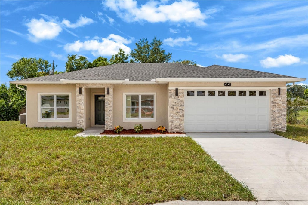 Photo of 1098 Fort Smith Blvd, Deltona, FL 32725 (MLS # O6447575)