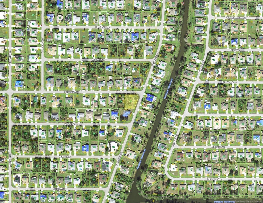 Photo of 23145 Donalda Avenue, Port Charlotte, FL 33954 (MLS # C7527309)