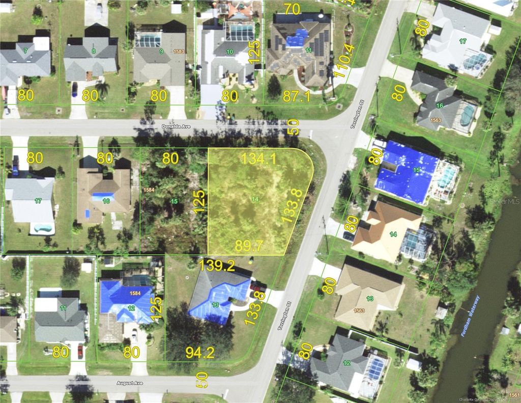 Photo of 23145 Donalda Avenue, Port Charlotte, FL 33954 (MLS # C7527309)