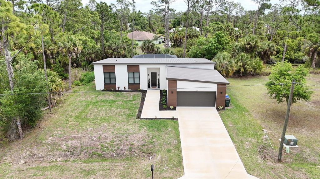 Photo of 1542 Sareta Terrace, North Port, FL 34286 (MLS # C7524627)