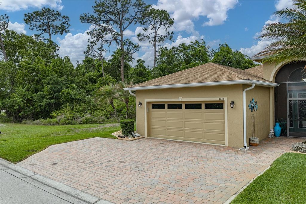 Photo of 5137 Winged Foot Lane, Winter Haven, FL 33884 (MLS # P4938411)