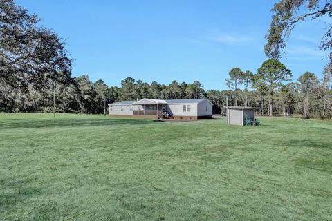 Photo of 141 Woods Road, San Mateo, FL 32187 (MLS # S5117604)