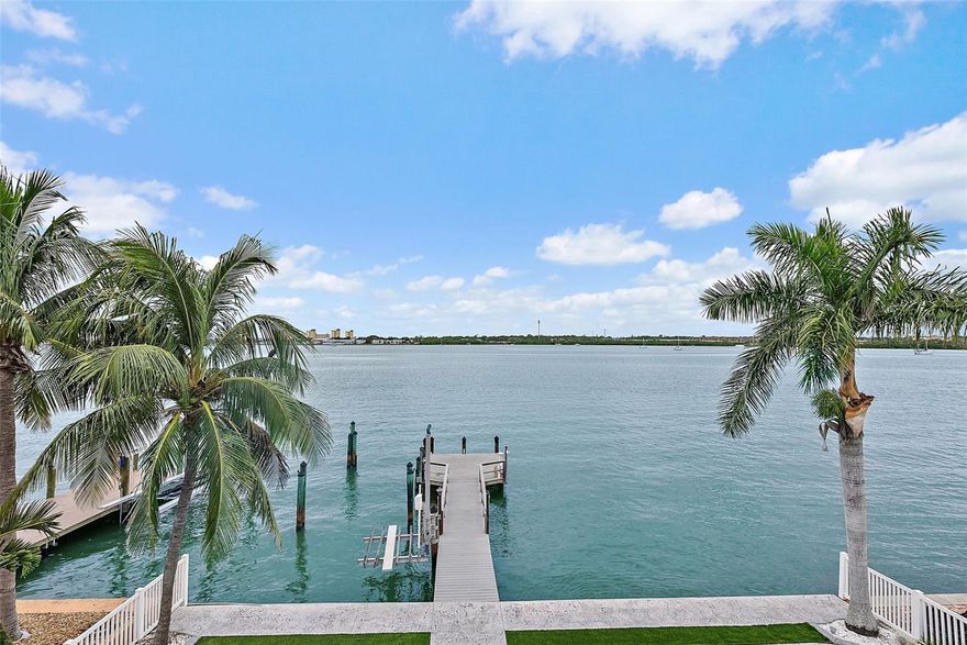 Paradise FOUND – you’re sure to love this Elevated Pool Home’s Key West / Old Florida architectural STYLE, it’s INTRACOASTAL WATERWAY VIEWS, the floor plan, and its space (TWO Living levels above a 1700+ sq ft Bonus Room and oversized 2 Car GARAGE; and 5,000+ Total sq feet ) …  POOL, Spa, Dock w/Kayak Lift, Impact Windows, Generac Generator +++ … all just a short boat ride to Johns Pass and the Gulf of Mexico! … This home exudes Coastal Casual Elegance and Relaxed Florida Vibes … Cue the Jimmy Buffet and Bob Marley music, there are Boat Drinks and a VERY Positive Vibration in store for the lucky new owner of this home! … WIDE Open, DIRECT INTRACOASTAL WATERWAY FRONTAGE and The VIEWS are EVERYWHERE … brought in by lots of windows and sliders (impact rated, of course) overlooking the Waterfront Panorama and Boating Activity … the Chef’s Kitchen is the focal point of the Main Living Level, with Subzero, Wolf and Bosch appliances … OPEN to the Living Area w/Balcony access ….you’ll also find a conveniently located Laundry Room and Pantry just off the Kitchen….this Main Level also has an approx 12’ x 14’ (plus Walk-in Closet) “Guest Suite” which can serve as a 2nd Master Bedroom, due to the LARGE adjacent bath; its GREAT open water views and direct access to the Large Lanai / Covered Balcony … this “2nd Master Bedroom” is “split” from the 2 OTHER Bedrooms and Bath at the opposite side of this main living level …. add to this “The Crow’s Nest” … your Top Floor, PRIVATE Master Ensuite Retreat which contains about 540 sq feet of PRIVACY, VIEWS and it’ s own balcony …. You’ve got it ALL going on here, and that’s just the INSIDE…. The HUGE Bonus Room downstairs can be put to good use maybe as storage for all of your “water toys”  and pool stuff … fishing or diving gear or “you name it”! … A couple of covered seating areas (one semi-enclosed) poolside for hanging our by the pool or entertaining your friends or family – or just watching the sun set -  as this home has a great sunset exposure, which kind of ices the proverbial cake here! HURRY on this great “Value for Money” opportunity and make YOUR appointment for a Private Viewing, TODAY!