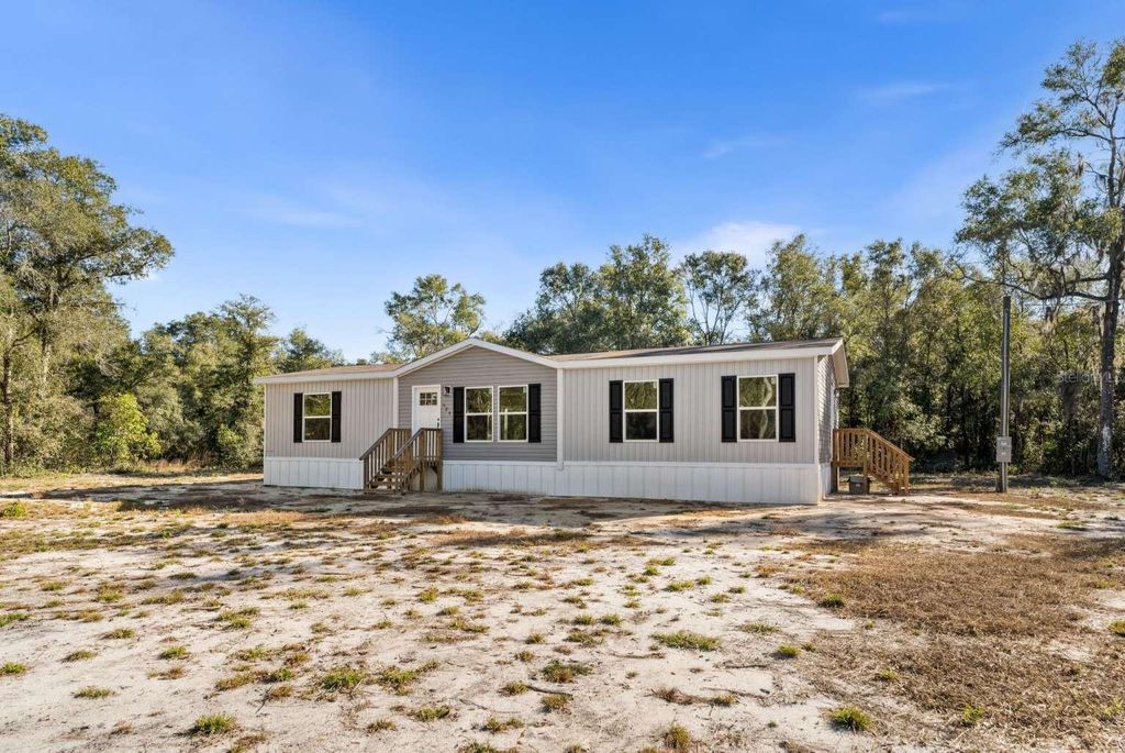 Photo of 528 NE 389 Avenue, Old Town, FL 32680 (MLS # TB8455362)