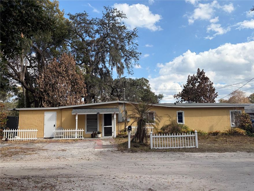 5 Bedrooms | No HOA | just more than a Quarter Acre.  Opportunity meets flexibility with this spacious 5-bedroom, 2-bath home situated on .27 lot — and no HOA.  Whether you’re a growing family needing space or an investor looking for strong rental potential (long-term or short-term), this property checks the boxes. This would be a great Airbnb.  Recent upgrades include smart home security features, updated light fixtures, and improved bathroom and kitchen ventilation. The seller is including the refrigerator, washer, and dryer — making this an easy move-in or turnkey rental opportunity.  The primary suite offers generous space and comfort, while the additional bedrooms are all well-sized. The home features abundant storage, multiple closets, and an abundance of natural light throughout.  A bonus Florida Room adds valuable flex space — perfect for a second living area, office, gym, or playroom.  The partially fenced backyard offers room to entertain, expand, or create your own outdoor oasis.  Great Location: • 35 minutes to Disney • 20 minutes to Downtown Orlando • 40 minutes to Orlando International Airport • Just over an hour to Florida’s East Coast beaches.  A 5 bedrooms with no HOA is rare. Whether you’re buying to live in or to generate income, this is a smart move.  Call today to set up a private tour.