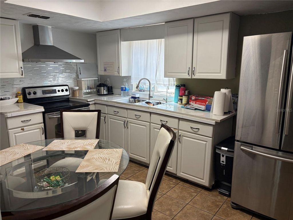 Photo of 5501 Vance Avenue, Orlando, FL 32810 (MLS # O6382708)