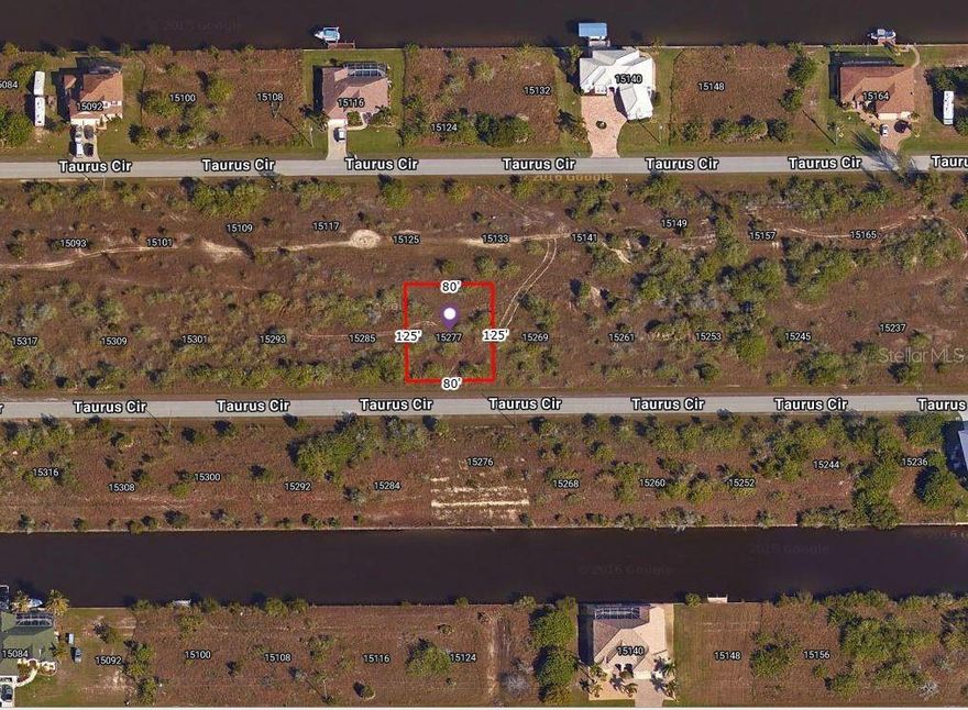 ONE OF TWO SIDE BY SIDE  Conveniently located building lot in  growing South Gulf Cove.   The lot on 15269 Taurus Cir belongs to the same owner and is on sale for the same price. Public water and sewer. Nine golf courses and world class Gulf of America beaches at Boca Grande within a 15-minute drive. Community boat ramp with access to 55 miles of canals and the Gulf of America.