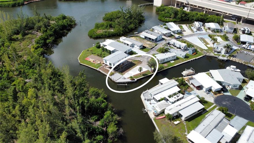 Vacant mobile home lot with an Excellent View on 2 canals with southern view. WELCOME TO PARADISE. Take your boat to the Gulf of Mexico within few minutes. Cleared lot ready to build your dream mobile home. It can be a double wide with plenty of room. Community is 55+. Few minutes to restaurants, downtown Venice, theatre and the beach. with low HOA fees you will have plenty of $ left over to spent. You are also close to golf courses, parks that have tennis, pickleball, basketball, baseball and everything you can think of. 
So, What are you waiting for?