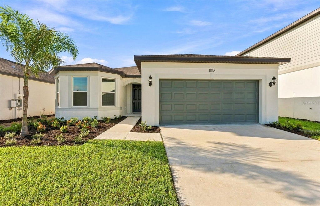 Photo of 11116 Sycamore Glen Loop, Thonotosassa, FL 33592 (MLS # TB8517745)