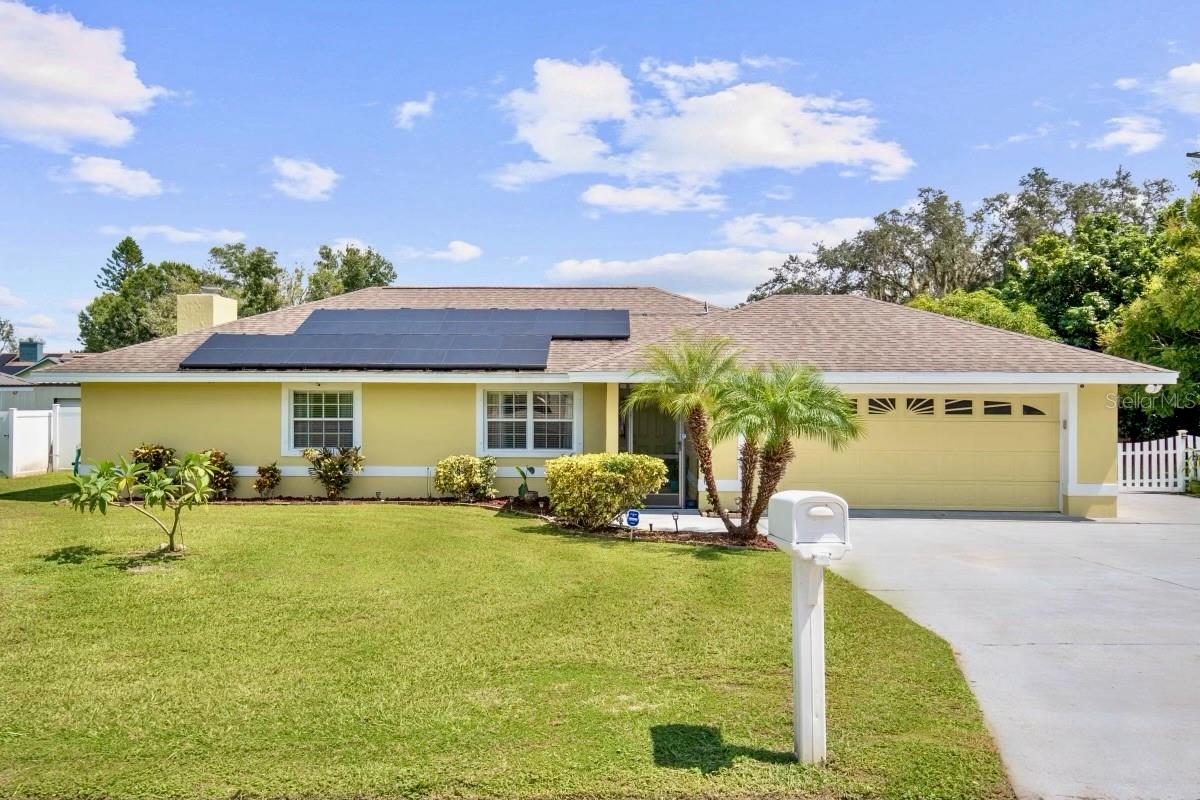 Welcome to this charming pool home in the highly desirable Lake Alfred. Situated on an oversized corner lot, with an abundance of matured fruit trees and steps away from Lake Haines! This spacious layout features 4 bedrooms with ample closet space, perfect for family living or hosting guests. The kitchen boasts with stainless steel appliances, plenty of cabinetry and granite counters with a large eating space at the kitchen island bar or formal dining area. The large family room has a wood burning fireplace exiting to a covered outdoor living space overlooking the beautiful blue pool. Additional features including a fully fenced rear yard, a large shed for tools and solar panels that you will definitely see a difference in your utility bills. Buyers will have access to entertainment, shopping, restaurants, golf courses, schools, hospitals, hiking/biking trails, fishing, boat ramps and SO much more! Close proximity to I-4 also guarantees easy commuting to Tampa and Orlando. Call to schedule your private showing today. Buyer to verify all property details.