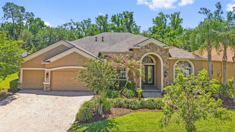 Photo of 27608 Pine Point Drive, Wesley Chapel, FL 33544 (MLS # TB8489634)