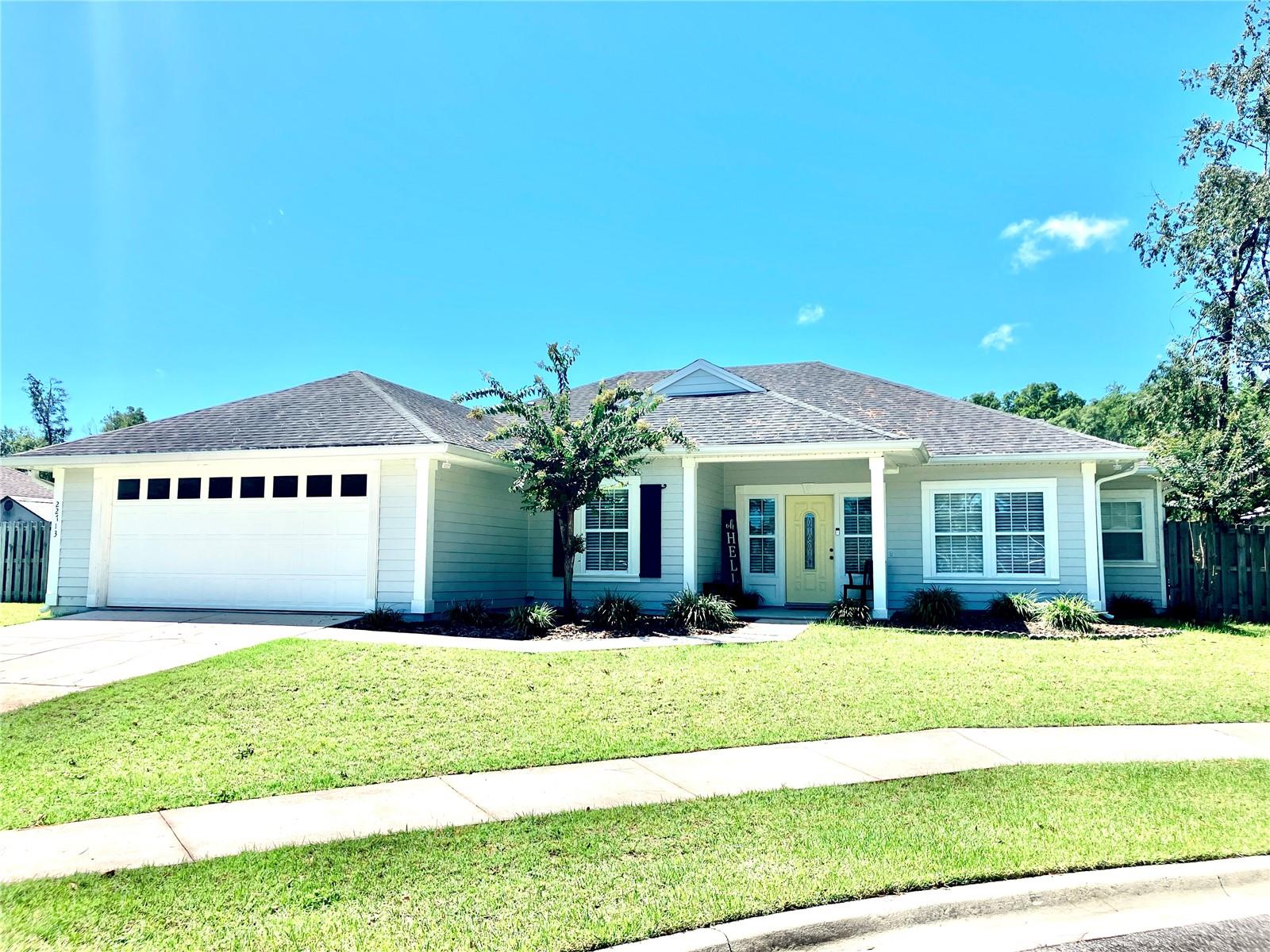 Come see this beautiful Custom Home in the highly sought after Neighborhood of Bailey Estates. This home features 4 bedrooms and 2.5 baths. Open floor plan with three year old stainless steel appliances in the kitchen, granite countertops and all wood cabinets. Gorgeous tile, wood floors, and crown molding throughout. Large walk in closets in every room. Double sinks in main bathrooms. Closets in both bathrooms. High ceilings neutral colors on interior. Covered front and back porch for those cooler days relaxing outside. Privacy in the backyard for family gatherings. 2 car garage great for storage or parking. This neighborhood is fantastic for walking, running and outdoor leisure. Come see your new home today!