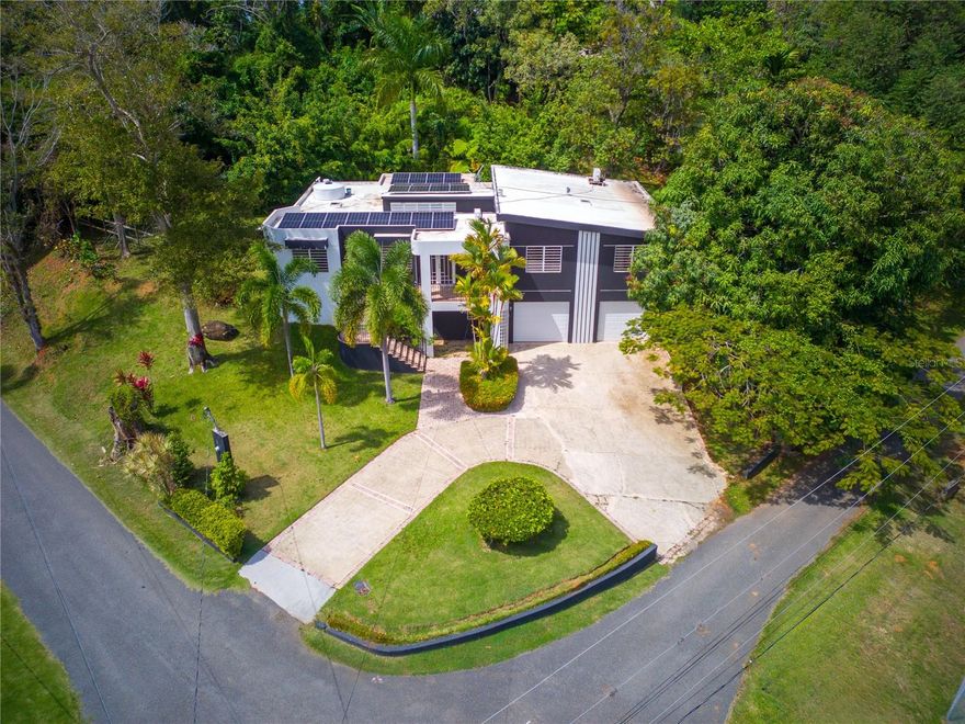 Home for Sale – Río Cañas, Mayagüez

Located in Río Cañas, Mayagüez

Appraised at $440,000

Spacious and well-maintained residence offering 5 bedrooms, 2 full bathrooms, and 2 half bathrooms, situated on a 1,943 square meter lot.

Property includes a private in-law suite, ideal for extended family or rental income potential.
Recent improvements include a newly sealed roof and 10 brand-new interior doors, including closets, laundry, and bedrooms.

Solar Energy System Assumable (valued at $21,000):
20 solar panels
2 batteries
Approximate monthly payment of $265

Infrastructure upgrades include a 550-gallon water cistern with automatic refill system and improved water pressure.

Additional features:
Four new A/C console units:
Living Room – 36 BTU
Primary Bedroom – 24 BTU
Guest Bedroom/Office – 12 BTU
Ceiling fans in living area
Gas water heater

Appliances and select furnishings included in sale: stove, washer, dryer, water heater, living room sofa, and desk.

Move-in ready property with energy efficiency, flexible living layout, and income-producing potential.

Layout measurements available

this vibrant city offers an exceptional quality of life. It is home to the University of Puerto Rico at Mayagüez, widely recognized as the island’s leading engineering institution.

The city also features excellent private schools, a diverse selection of restaurants, shopping centers, and year-round cultural and community events.

Stay tuned for the upcoming mixed-use district development planned in the heart of the city, adding even more value and growth to this dynamic area.