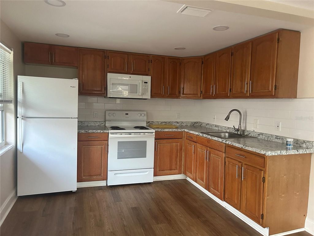 Photo of 2824 Meadow View Avenue, Largo, FL 33771 (MLS # TB8458833)