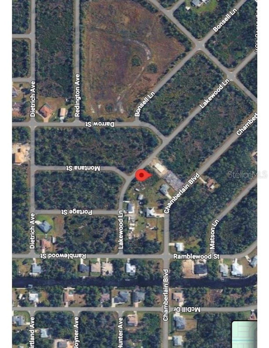 Photo of 301 Lakewood Lane, Port Charlotte, FL 33953 (MLS # D6146178)