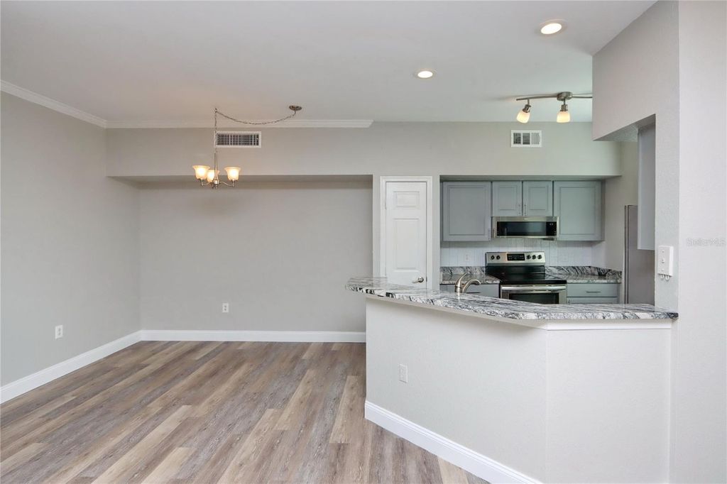 Photo of 9088 Lake Chase Island Way #9088, Tampa, FL 33626 (MLS # TB8456334)