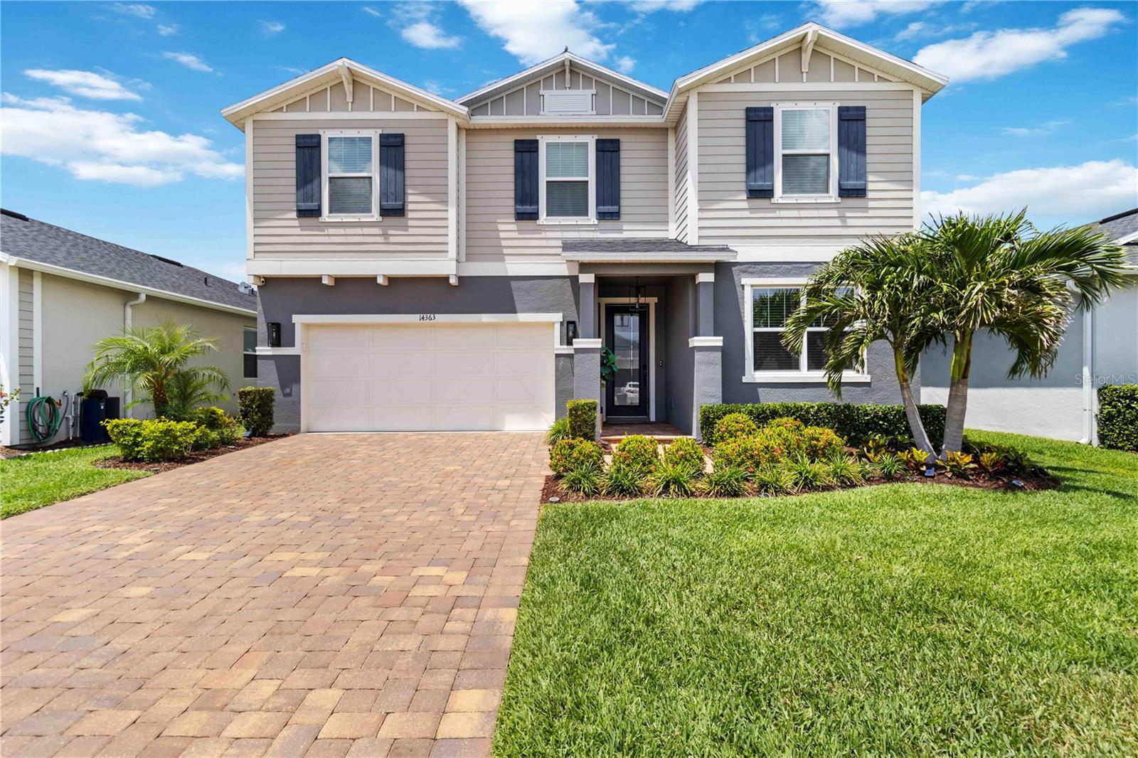 This exquisite, like new, 2021 built, heated SALTWATER POOL home is located in the charming community of Avaunce in Lakewood Ranch where residents enjoy LOW HOA fees and NO CDD fees!!! As you step inside, you will be WOWed by the modern yet cozy designer upgrades throughout. Elegant luxury vinyl wood plank floors adorn the entire first floor. A den/office is located just off the open foyer featuring beautiful glass French doors. Also off the foyer is a spacious formal dining room overlooking the living room that is highlighted by a gorgeous, custom-built, brick fireplace/TV wall. The stylish kitchen is a focal point featuring granite countertops, a spacious island, 42 inch soft close cabinets, and NEW upgraded Whirlpool stainless steel appliances that will elevate your culinary experience. A mudroom, oversized pantry, and indoor storage space offer practical convenience for organization and functionality. Upstairs you will find 4 spacious bedrooms and a large loft/family room that provides additional versatile living space for relaxation and entertainment. The master bedroom features an oversized walk-in closet and a master en-suite with a spacious shower and double vanity for added comfort and luxury. The convenience of laundry upstairs streamlines your daily routines. Most rooms are equipped with fans for optimal comfort. The bathrooms feature upgraded raised cabinets and granite countertops adding sophistication to your daily rituals. A whole house water softener adds to the extensive list of upgrades. Step outside to your private oasis featuring an enclosed HEATED SALTWATER pool with an oversized sun shelf, perfect for year-round enjoyment and a fenced in backyard for enhanced privacy. Your peace of mind is ensured with the upgraded home security system. Avaunce is a gated community that offers a community pool, outdoor kitchen for residents to enjoy, and activity center. This amazing community is conveniently located within a short distance to Publix, shopping plazas, restaurants, and great schools. Everything you need is within reach. Plus, with Lakewood Ranch's proximity to beautiful beaches, this is truly a place you'll be proud to call home!