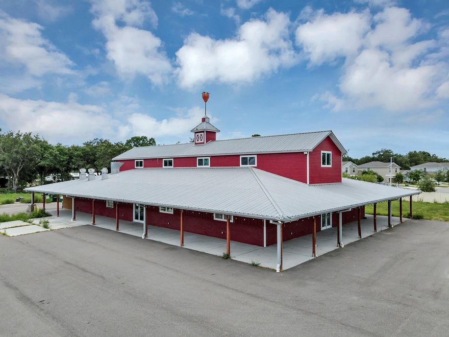 Located in one of the fastest-growing regions of Southeast Hillsborough County, 10070 Fern Hill Drive offers an exceptional opportunity. This property spans 3.74 acres MOL and features a prominent freestanding retail building with a total area of 8,000 sq ft. The first floor, which encompasses nearly 6,000 sq ft, boasts a large open space with a commercial kitchen, making it ideal for various uses, such as retail, dining, or event hosting. The second floor adds an additional 2,000 sq ft, including four private offices, open areas, storage, and two bathrooms.
Strategically positioned with high visibility from Gibsonton Dr (AADT 15,200), this property is perfectly situated for an owner user or redevelopment. The expansive land and prime location offer significant potential for future growth. For those interested in exploring this opportunity further, please contact us to schedule a private showing. This is an ideal chance to invest in a high-exposure property in a dynamic area of Riverview.