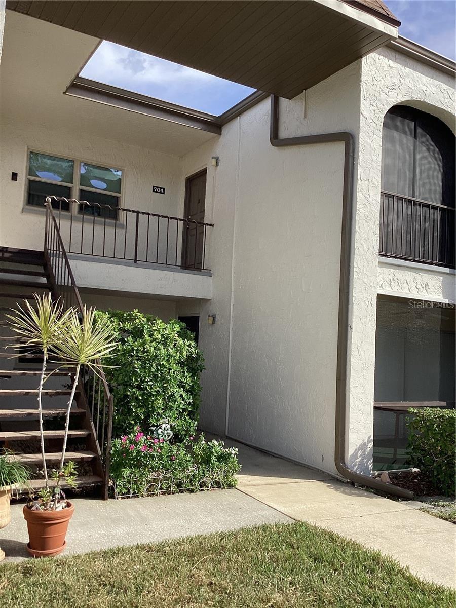 FURNISHED 55+ COMMUNITY! ANNUAL RENTAL* 2nd Floor Studio, New Tile floor wall to wall, new paint with 2 balcony /lanai Front and back. Everything is included except electric up$100 a month. This lovely home is located at Boulevard Club, centrally located to shops, restaurants, banking, and of course, our award-winning Gulf beaches and so much more that fit your lifestyle. The Boulevard Club complex offers 2 heated swimming pools, a recreation center, Tennis courts, and Shuffleboard. Tenant MUST be 55+. No Pets allowed. There is a $100 non-refundable application required fee to the Boulevard Club (required by the HOA). Minimum 7 months+ rental term ONLY.