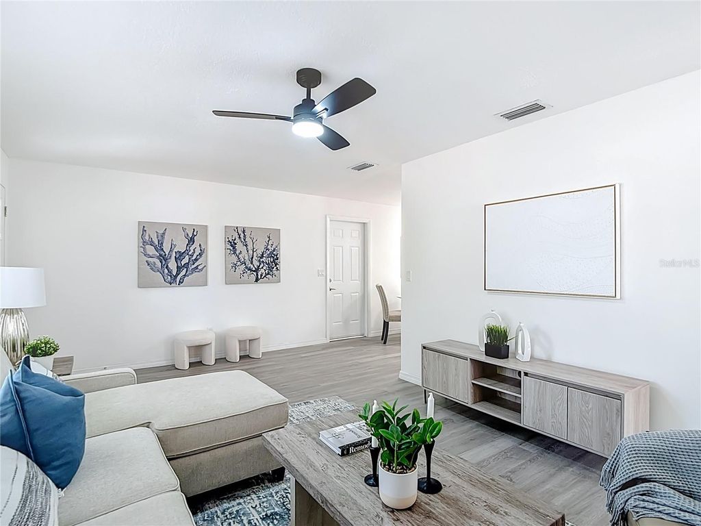 Photo of 10017 N Hartts Drive, Tampa, FL 33617 (MLS # O6364718)