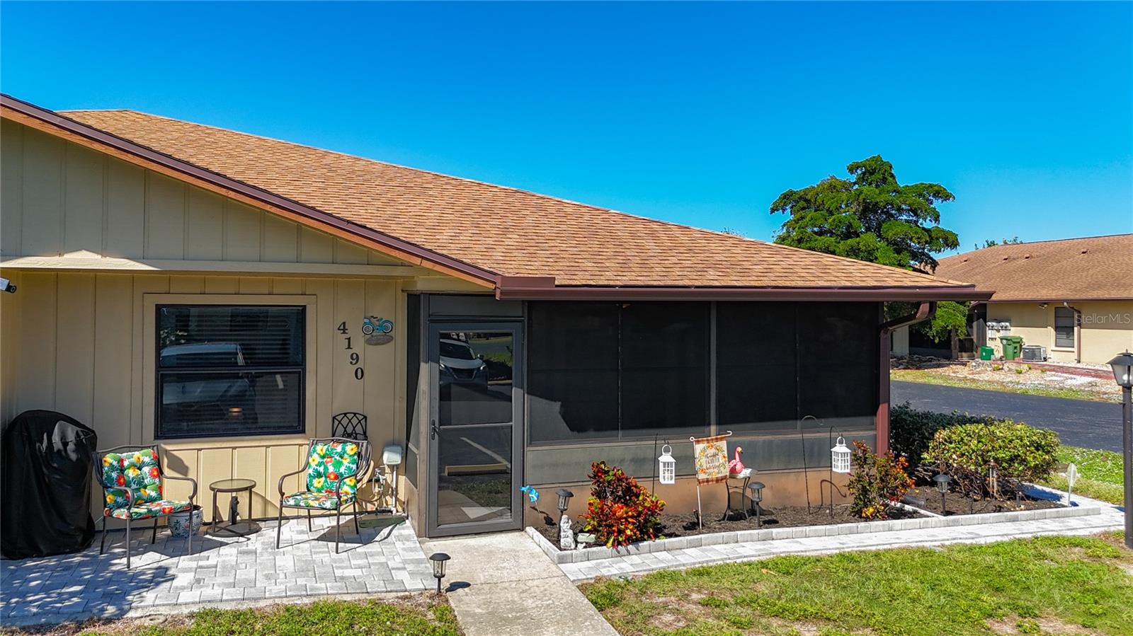 LOOKING FOR A 55+ VACATION OR RETIREMENT HOME WITH A FLORIDA VIBE...THIS IS IT! 2 Bedrooms 2 Bath COZY home with lots of relaxing exterior spaces; one for each bedroom, main entrance, and even paved spaces for barbeques and watching the beautiful Bradenton sunsets. Completely updated with new ceramic tile floors and carpeting in bedrooms. New kitchen cabinets, with granite counter tops and in bathrooms. Breakfast bar and a designated coffee station. New appliances with a Double Oven. Murphy bed in 2nd bedroom for overnight guests, and office/craftroom during the day. Both Lanai are screened in with New Florida windows. Paved Patios (3) 2023. A/C 2.5 ton, and new heat pump 2021. Air Handler 2019, and Water Heater 2018. French Doors in 2nd bedroom leading out to enclosed front porch. New vanities in bathrooms with High Efficiency toilets. Walk-in Shower in Master Bathroom. Spacious storage closet in enclosed Lanai from Master bedroom. Community has a Pool with outdoor shower and amenities, Clubhouse for social events, Pool table, Ping Pong, Bingo, Shuffle Board, Banquet Hall, BBQ Grill, and Walking Trail. Home is 7 minutes from Anna Maria Island, with a bike path from the Community to the Beach. Gulf Ferry to Anna Marie Island. Close to numerous places like Robinson Preserve, DeSoto National Memorial, Bishop Planetary, Hospitals, Shopping, Restaurants, River Walk, historial Bradenton, and so much more. Home and Florida awaits you!! JUST MOVE RIGHT IN!!