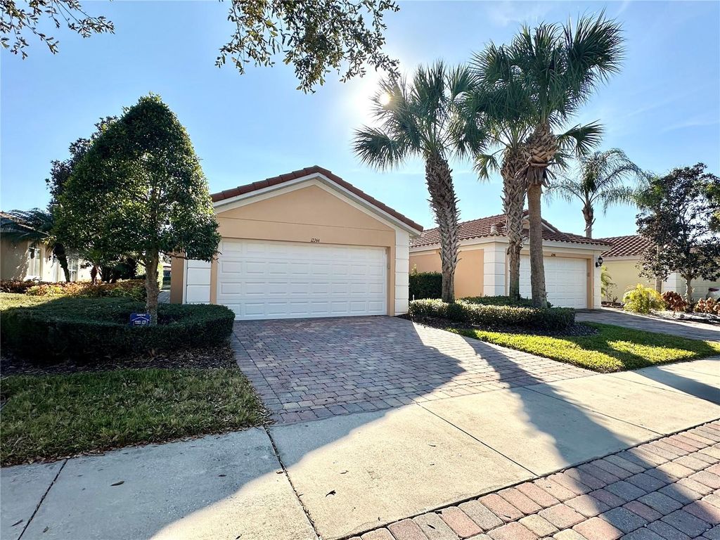 Photo of 12244 Pescara Lane, Orlando, FL 32827 (MLS # O6381360)
