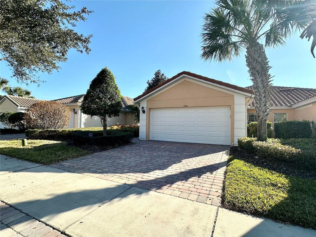 Photo of 12244 Pescara Lane, Orlando, FL 32827 (MLS # O6381360)