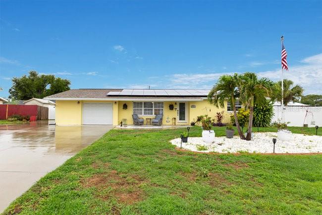 You won't want to miss this one! Well maintained 2 bedroom (with option for 3rd), 2 bath home in the quiet and perfectly located community of Country Club Acres. Walk thru the front door and you will be welcomed by the bright and open floor plan. The newly remodeled kitchen features stainless appliances, quartz counters, solid wood cabinets, farmhouse sink and a work island. Dining room features a built in sideboard with upper cabinets. Both bathrooms have been recently updated. Large pantry/utility room and seperate laundry room only, and garage workshop all add additional convenience. Just off the dining room is a bonus room, complete with a closet so can be used as third bedroom or office. The streamlined layout of this home is perfect for family gatherings or entertaining. but the inside is just the beginning!! Outside you will find a sprawling entertainment area complete with pool, gazebo, outdoor bathroom and shower stall, and storage shed. The sparkling pool has a large tanning ledge, big enough for 4 loungers. Grab the gang for a pool party! Or just bask in the beauty and serenity of your own pool! Location is excellent - close to airport,downtown Sarasota, and only. 20 minutes to beach. Grab this one before it gets away!!