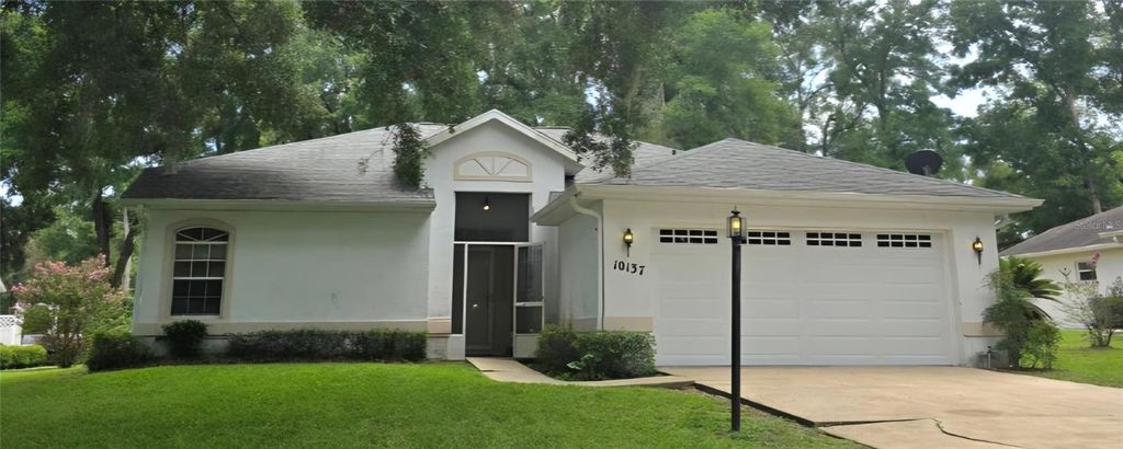 Photo of 10137 SW 192nd Circle, Dunnellon, FL 34432 (MLS # O6354367)