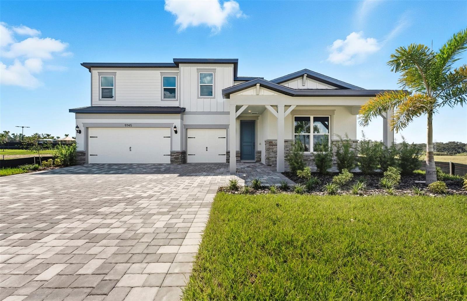 One or more photo(s) has been virtually staged. Move in Ready Available NOW!! Pulte Homes is Now Selling in Spencer Glen in Riverview, FL! These new homes offer an unparalleled living experience for families seeking the perfect blend of modern comfort and Florida's natural beauty. This new community will feature a resort-style pool with an open cabana, a clubhouse, sports courts, dog park, playground and much more! With its prime location within one mile from the I-75/Big Bend interchange and HWY 301, Spencer Glen provides easy access to commuting corridors, entertainment, and shopping.
This new consumer-inspired home design, the Mahogany Grand, has all the space you need with the designer finishes you’ll love. The gourmet kitchen showcases a large center island with cabinets, a 50/50 stainless steel sink, modern white cabinets, quartz countertops with a tiled backsplash, a walk-in pantry, and KitchenAid stainless steel appliances including a built-in oven and microwave, dishwasher, and stovetop with wood canopy hood.
The Owner’s bath features white cabinets, quartz countertops, a walk-in shower with shower niche, a linen closet, dual sinks, and a private commode. There is 18”x18” floor tile in the main living areas, baths, and laundry room and stain-resistant carpet in the bedrooms and loft.
This home makes great use of space with a 1st-floor Owner’s suite with a large Owner’s retreat area and spacious walk-in closet, a 2nd story with a loft, and an enclosed flex room. There’s also storage under the stairs, a convenient laundry room with utility sink, a covered lanai, and a 3-car garage.
Additional features and upgrades include tray ceiling in owner’s suite and retreat, floor outlet, upgraded lighting and door hardware, crown molding in the living area, flex and owner’s suite and a Smart Home technology package with a video doorbell.
Enjoy peace of mind with Pulte’s transferable, 10-year Limited Structural Warranty that covers materials and workmanship in the 1st year, workability of plumbing, electrical, HVAC, and other mechanical systems through the 2nd year, various types of water infiltration and internal leaks through the 5th year, and the structural integrity of the home through the 10th year. Plus, we’re currently offering limited-time incentives and below-market rates!