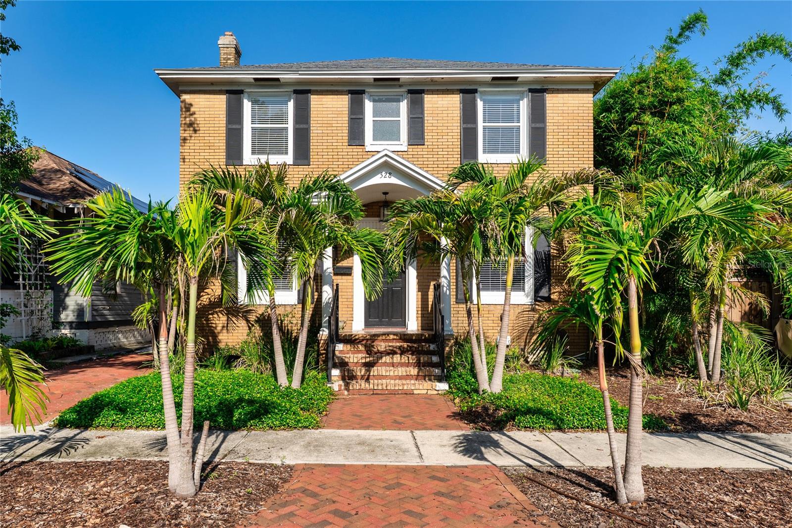 If you’re still searching for a rental, it’s time to stop! Your dream home is right here in Uptown, St. Petersburg. This fabulous two-story brick beauty is just steps from Round Lake with skyline views and major neighborhood charm. Inside? Prepare to be wow’d. A grand living room with a cozy fireplace, a built-in wet bar, and dining space for eight, perfect for entertaining. And the KITCHEN? She’s a star, think designer pendant lights, ceramic tile, endless cabinet space, and countertops that scream luxury. Downstairs also features a half bath, laundry room, and a chic junior en suite. Upstairs, the primary suite is giving spa day everyday with a soaking tub + walk-in shower. Plus two more bedrooms and a bonus flex space out back for your office, gym, or studio. This is a must-see, schedule your showing now before it’s gone!
