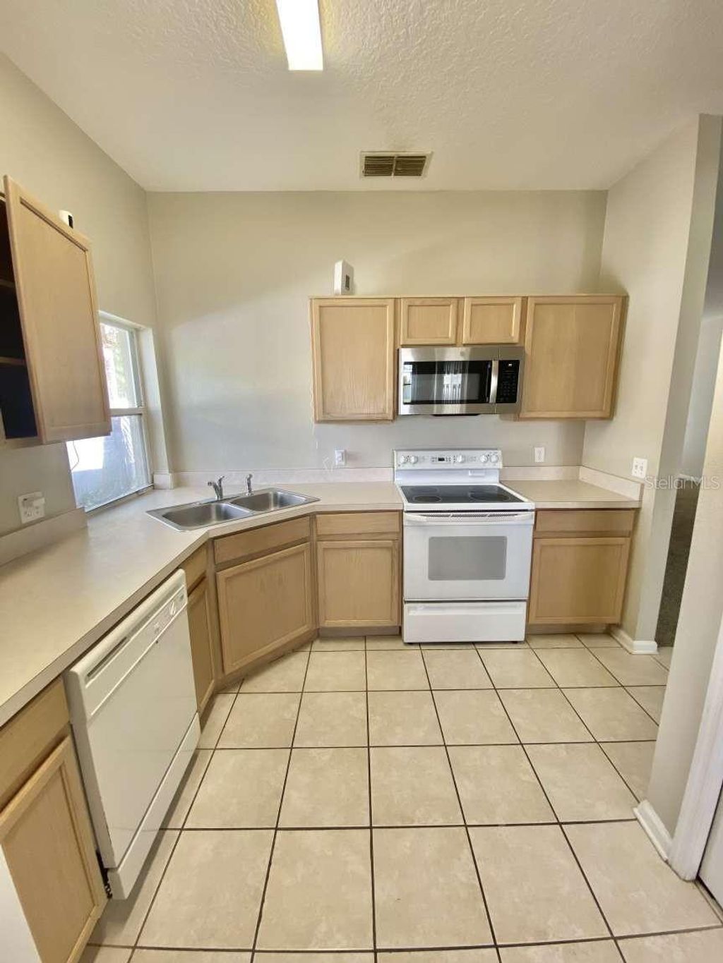 Photo of 3111 Cranes Cove Loop, Kissimmee, FL 34741 (MLS # TB8467009)