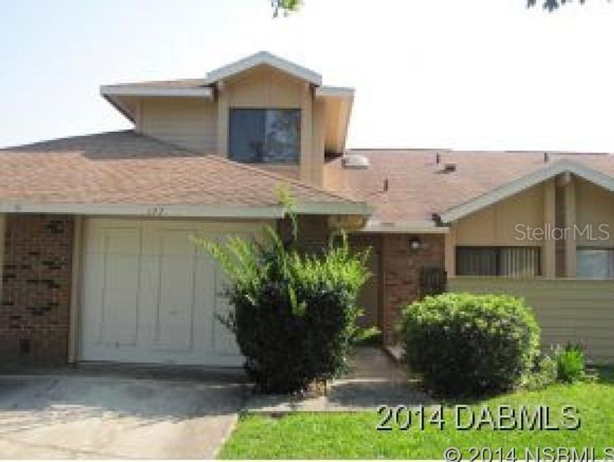 -DONâT MISS THIS ONE!! Daytona Beach 3 bedroom 2.5 bath town home overlooking the golf course in the desirable GATED Pelican Bay community. Open bright floor plan with large updated eat in kitchen, new STAINLESS appliances and a breakfast bar too. Dining room living room combination with Soaring vaulted ceilings, fire place and ceramic title floors. The entertain space also offer a powder room for guest use. Master bedroom down with second and third bedrooms upstairs for added privacy. Nicely sized rooms and closets. Florida room overlooking the golf community is a perfect place to relax, and enjoy the water, and golf course views. Attached garage with newer water heater. The home has been resided and painted, as well a a new A/C system, updated lighting installed in the past year. Towns mini association takes care of exterior paint, pest control, lawn, building insurance and more. $606.00 dollar per year master association takes care of 24hr guarded security and common areas. Enjoy the Florida lifestyle, Near shopping, schools and hospitals, just a few minute drive to the WORLD MOST FAMOUS BEACH.  ** DRIVEWAY FOR THIS HOME AND THE ADJOINING HOME WILL BE COMPLETELY RE-POURED WITHIN THE NEXT TWO WEEKS****** ;Water: City