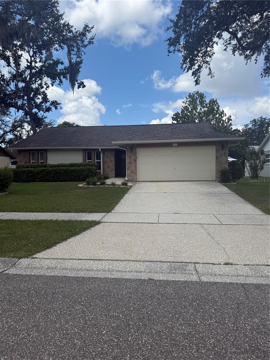 This beautifully maintained home offers a spacious front yard with mature oak trees and well-kept landscaping, all fully enclosed by fencing for added privacy. Enjoy the oversized screened-in room—perfect for relaxing or entertaining—as well as a two-car garage with an automatic opener. Inside, you'll find a separate living room and dining area, ideal for comfortable family living. The kitchen is equipped with newer appliances, elegant stone countertops, and a stylish upgraded backsplash. Each room is outfitted with a ceiling fan for added comfort. Meticulously cared for, this home stands apart from typical rentals—reflecting the pride of ownership throughout. Available for immediate move-in. Schedule your showing today!