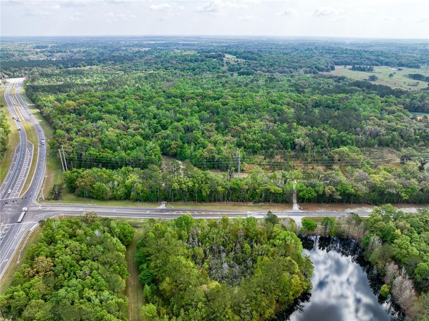 370 Acres (mol) with frontage on busy Cortez Blvd (SR 50) and Emerson Road that is currently zoned Agriculture, and has 4 parcels all being sold together. Multifamily and Single Family Development opportunity with the Master Plan to be reactivated for rezoning of approximately 88 acres with a Flood Zone of X. (Other 3 parcels are AE) The Master Plan that was approved for rezoning to CPDP by Hernando County has since expired. It was originally approved for a 263 unit with combined single family and multifamily housing development with a mix of 6,600 sf and 1 acre lots. This beautiful property has rolling hills, open meadows, has a nice variety of trees, and a small amount of frontage on the lake. Included with this land is a 4 bedroom home with a pool set on top of the highest point of the property and has incredible views. There are remains of older farm buildings that are not being used. Key#: 01249358,00362280,00362057,01355599 Old Survey attached/Being Sold As Is.