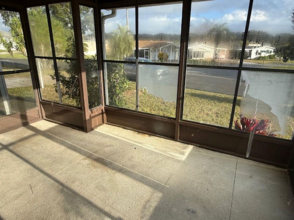 Photo of 1832 W Schwartz Boulevard, Lady Lake, FL 32159 (MLS # OM715948)