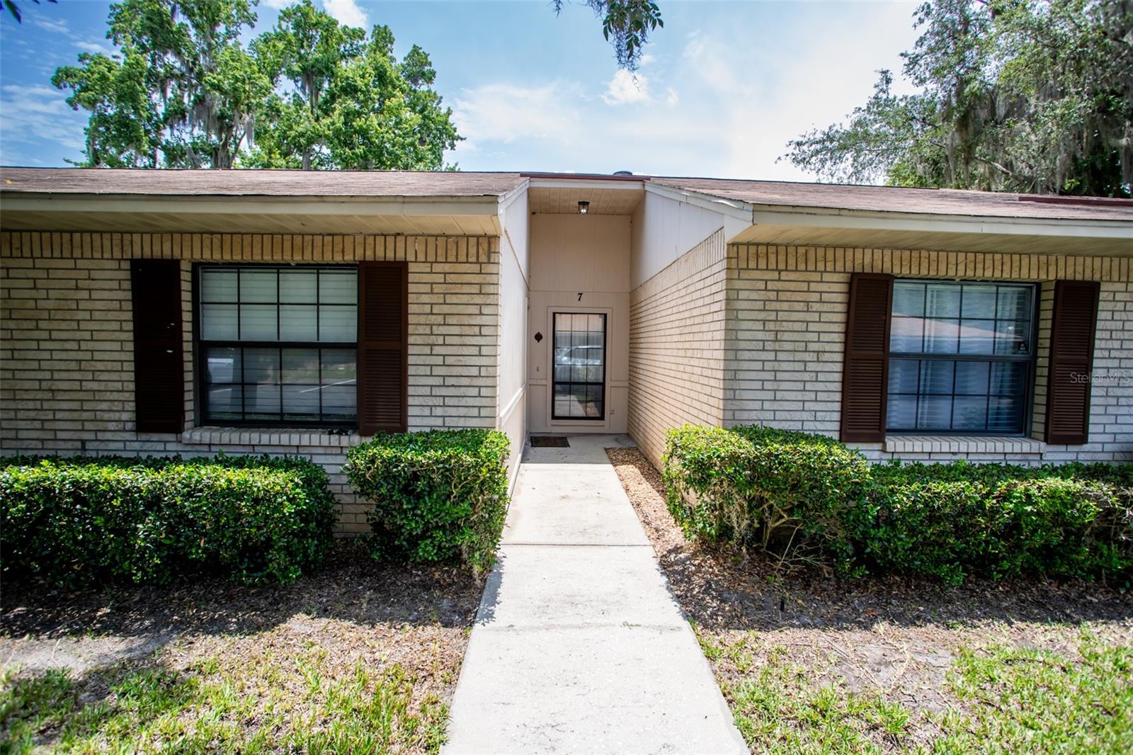 Discover tranquil waterfront living in this beautifully remodeled 2-bedroom, 2-bath condo, perfectly situated in a quiet 55+ community in charming Melrose, FL Enjoy water views from your private screened-in porch--ideal for morning coffee or unwinding at sunset. Step inside to a bright, open-concept living and dining area filled with natural light. The modern kitchen boasts sleek stainless steel appliances, updated cabinetry, and finishes designed for both function and beauty. Both bedrooms offer generous space and comfort with the primary suite featuring a private en-suite bath and ample closet space. A RARE BONUS, THIS UNIT INCLUDES ITS OWN PRIVATE GARAGE--perfect for your vehicle, extra storage and added convenience. Surrounded by majestic, mature oak trees in a meticulously maintained community, this move-in-ready condo offers a low-maintenance, nature-connected lifestyle that's truly hard to find.