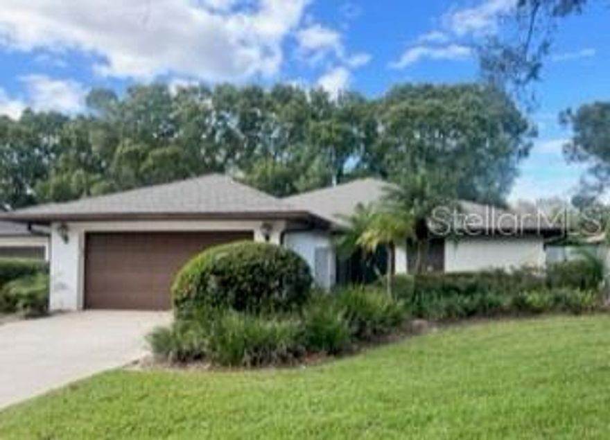 Multi Offers! BRAND NEW ROOF! Discover serenity in this tranquil community nestled in Greenleaf Estates. This delightful three-bedroom, two-bath home boasts over 2,000 square feet of living space and is fully furnished.  The expansive living area features a wet bar, complete with an ice-maker and wine fridge, making it a hub for entertainment. Enjoy meals in eat in kitchen or in the formal dining room complete with a terrace. The large master suite offers double walk in closets and an en suite bathroom including a walk-in shower and double sink vanities. The 2nd bedroom has ample space and shares the guest bathroom with tub/shower. The 3rd bedroom is located off the living room and has double pocket doors. Step out onto the huge screened lanai and experience the Florida lifestyle at it's best! Relax, dine, and enjoy the beautiful fall Florida weather. Situated directly across from the Lake Abbey, the property is adorned with mature landscaping and majestic oak trees, creating a truly picturesque setting. For those who love a community amenities, the community pool is just a short distance away and offers a refreshing escape from the Florida sun. This is a golf cart friendly community and offers low HOA fees and this is your perfect place to call home