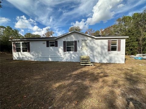 Photo of 28430 SW 97th Lane, Newberry, FL 32669 (MLS # TB8351580)