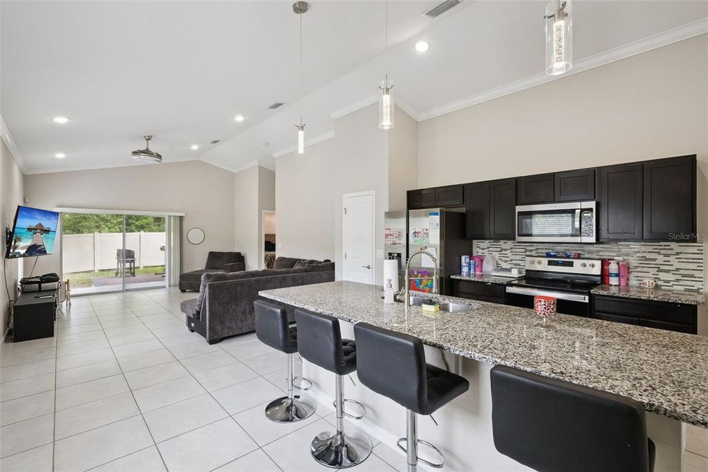 Photo of 520 S Kentucky Avenue, Deland, FL 32724 (MLS # S5148926)