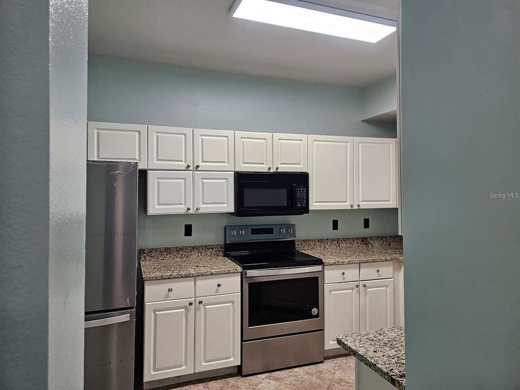 Photo of 5506 Metrowest Boulevard #13-103, Orlando, FL 32811 (MLS # O6423124)