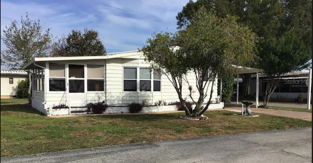 Photo of 340 Windsor Drive, Port Orange, FL 32129 (MLS # V4944560)