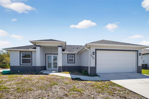 Photo of 4630 Gene Avenue N, Lehigh Acres, FL 33971 (MLS # O6392570)