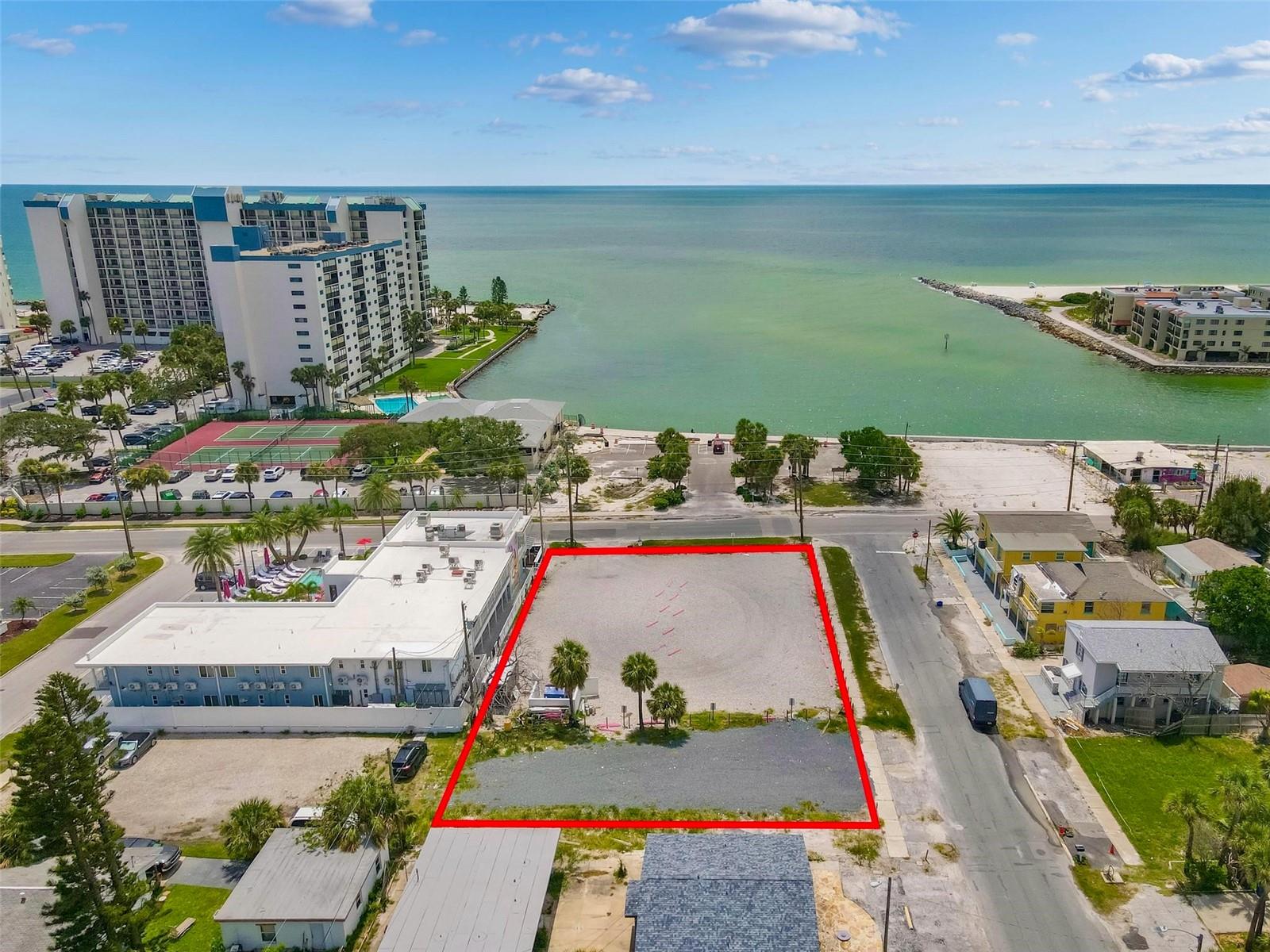 Exceptional Development Opportunity in St. Pete Beach! This prime .47-acre vacant residential lot is a true rarity—nothing like this remains in this sought-after area. Located caddy-corner from the former Woody’s Waterfront site, a beloved landmark, and directly across from City Park on Sunset Way, which follows the waterline along the city’s scenic northwest edge. With the park and waterfront as your backdrop, enjoy uninterrupted, mesmerizing views of Gulf sunsets and the Blind Pass inlet for years to come.
The City of St. Pete Beach has confirmed zoning for up to 12 condominium residences with a pool and parking underneath, with a maximum height of 45 feet from BFE. This is a rare, once-in-a-lifetime opportunity to build in one of the area’s most iconic locations, with the added potential to acquire adjacent hospitality and restaurant properties for an even greater project footprint.
Where the Gulf of Mexico meets opportunity—this property is unlike anything else on the market today.