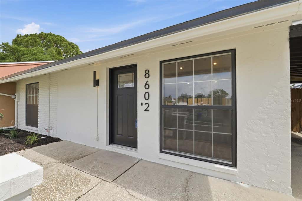 Photo of 8602 Briar Grove Cir, Tampa, FL 33615 (MLS # TB8531152)