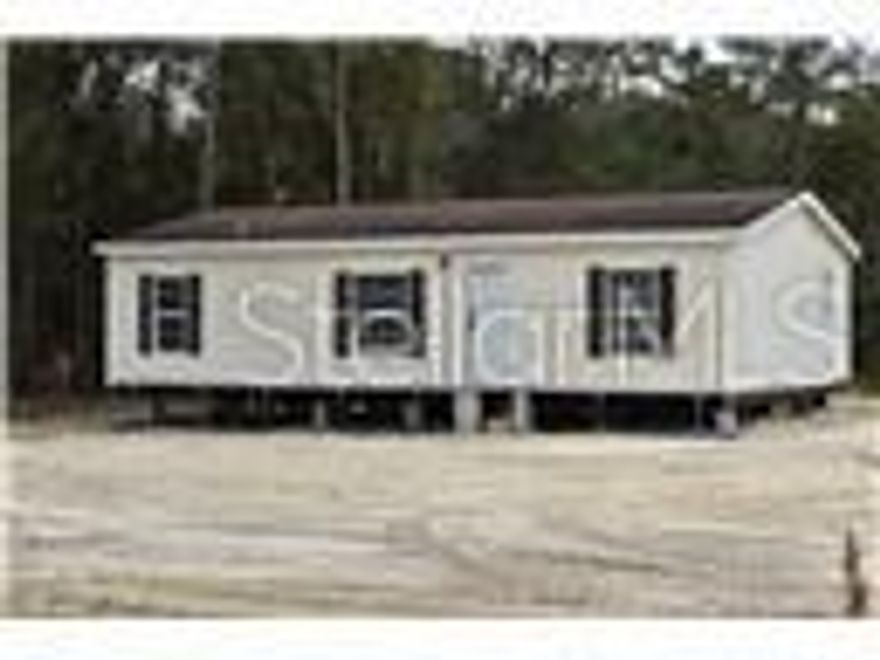 Great news! The owner is now going to offer financing. With 45% down and 7% interest. The balloon payment due date and length of loan is negotiable. The mortgage is assumable at her bank at her current interest rate of 2.5% Certificate of Occupancy has been issued. The home has passed all pertinent inspections from the county! All practically new! Well and Septic system installed new electric new ac unit. Home sits between Ocala and Dunnellon off of Hwy 40. Close by is the Rainbow River and The World Equestrian Center. Schedule a showing today and be one of the first to get an opportunity to own this almost like new with an awesome location and beautiful.