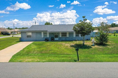 Photo of 4731 SW 138th Loop, Ocala, FL 34473 (MLS # OM733974)