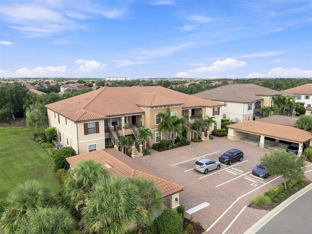Photo of 13608 Messina Loop #103, Bradenton, FL 34211 (MLS # A4704998)