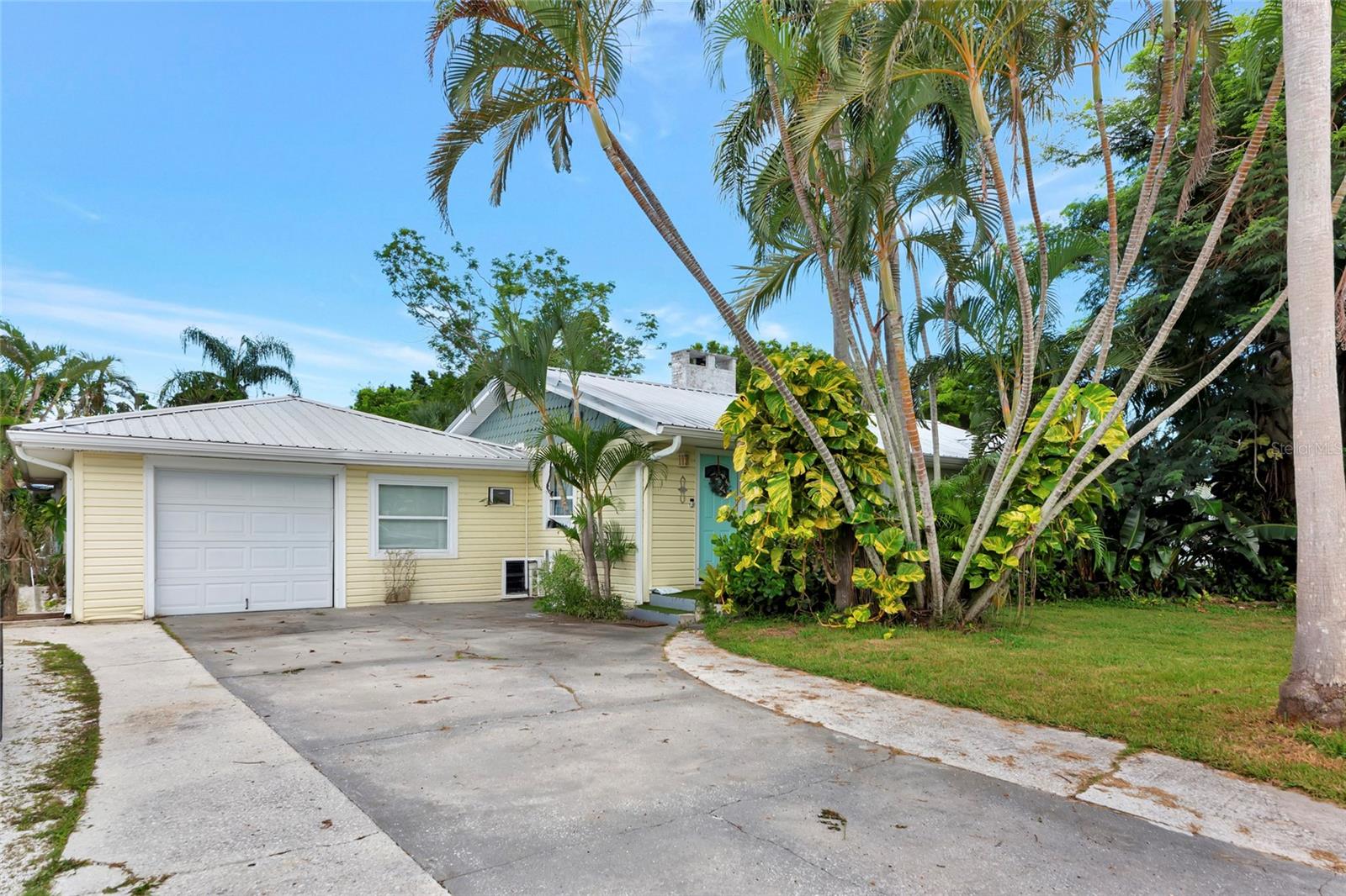 Welcome to your very own slice of paradise, surrounded by shady palm trees and just over a mile from the sandy shores of Crescent Beach. Nestled in a non-HOA community, this unique and versatile property offers two separate living spaces on a single lot, making it ideal for multi-generational living, long-term rental income, or the opportunity to live in one unit while renting out the other. As you walk into the main residence, there is an expansive, open-concept living room that flows seamlessly into the kitchen and dining area. This layout creates a warm and inviting atmosphere, perfect for hosting friends and family or simply enjoying the laid-back Florida lifestyle. The kitchen is spacious and functional, featuring ample wooden cabinetry, plenty of counter space for cooking lavish meals, while the dining area is bright and welcoming, overlooking the pristine backyard. Just ahead, you will find 2 generously sized bedrooms and a flexible den that could easily serve as a 3rd bedroom, home office, or guest space. There is a tastefully updated bathroom that adds to the appeal, showcasing a sleek, modern design with a massive walk-in shower. Tucked privately behind the main home is a fully updated and beautifully remodeled 1 bedroom, 1 bathroom guest or in-law suite that exudes both style and comfort. Thoughtfully designed with its own side entrance, this attached unit features a bright and open-concept living and dining area, creating a welcoming space that feels like home. The fully equipped kitchen is outfitted with warm wooden cabinetry and stunning stainless steel appliances, providing both functionality and modern appeal. Whether used as a private retreat for extended family, comfortable accommodations for guests, or a high-demand rental for added income, this secondary living space offers incredible versatility, privacy, and convenience for a variety of lifestyle needs. Outdoors, the property continues to impress with a spacious, fully fenced backyard that offers both beauty and functionality. Surrounded by lush, mature landscaping, this outdoor retreat is ideal for relaxing afternoons, dining alfresco under the Florida sun, or enjoying quiet evenings beneath the stars. The expansive yard provides plenty of room for pets to roam freely and safely, as well as abundant space for gardening, outdoor entertaining, or even the addition of a pool or play area. With no HOA restrictions, you have the freedom to make the outdoor space truly your own. The screened-in back porch is accessible to both units and includes laundry hookups, making it a practical and comfortable shared space. A one-car garage offers additional storage or protected parking. Centrally located, just minutes from the beach, and within easy reach of restaurants, grocery stores, shops, commuter routes, and everyday conveniences. For those considering an investment, Sarasota County allows monthly rentals in this area, and both units are currently tenant-occupied with month-to-month leases offering the new owner immediate income potential. Whether you’re searching for a beach-close primary home with extra space, a flexible multigenerational setup, or a turnkey rental investment with built-in tenants, this exceptional property has it all. Don’t miss your chance to own this rare gem. Call today to schedule a showing before it is gone!